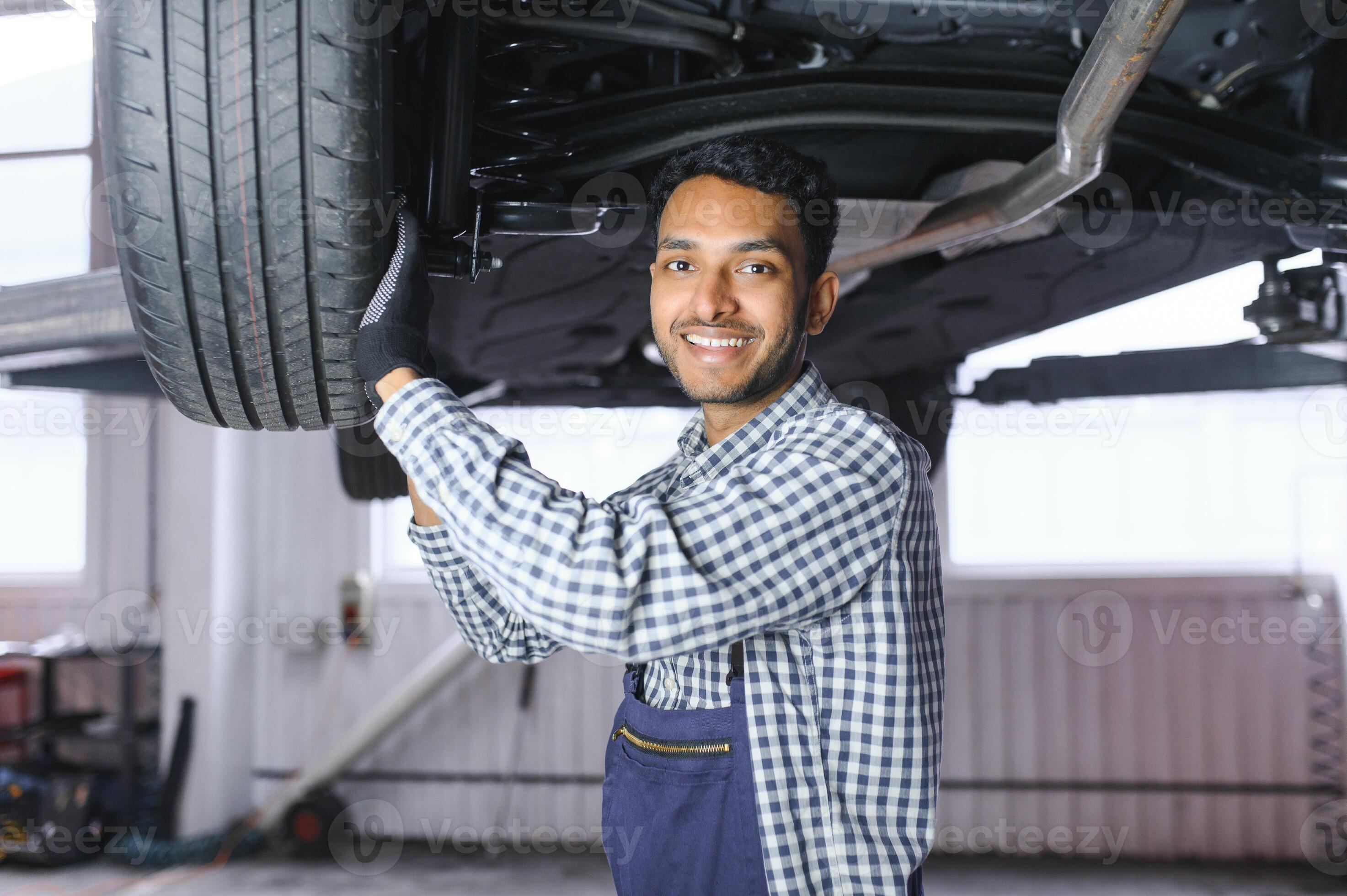 Mechanic working on car